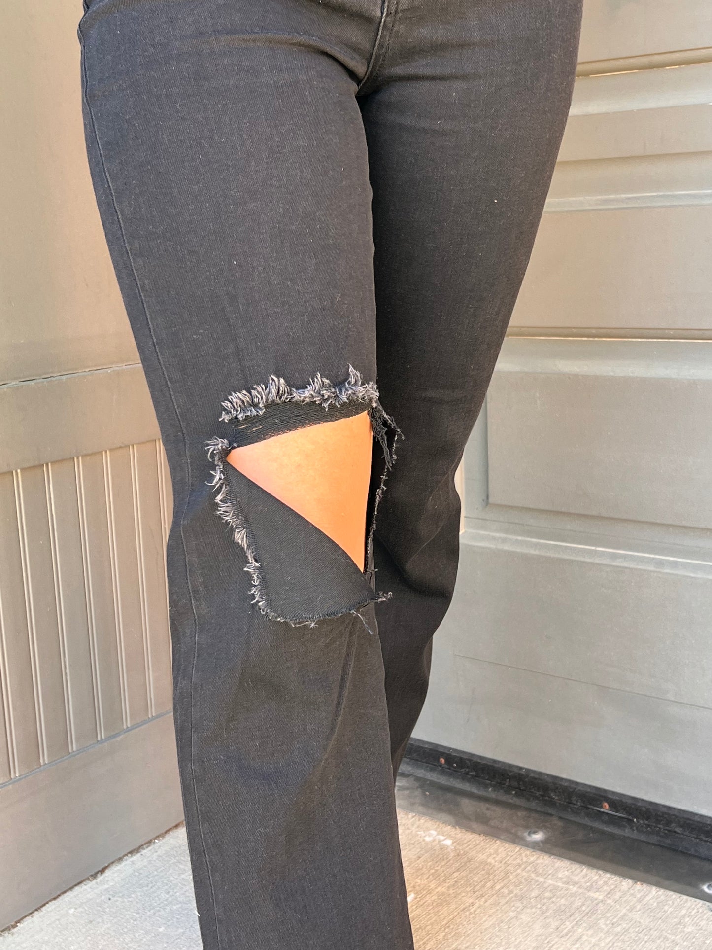 The Risen Black Distressed Denim Jeans