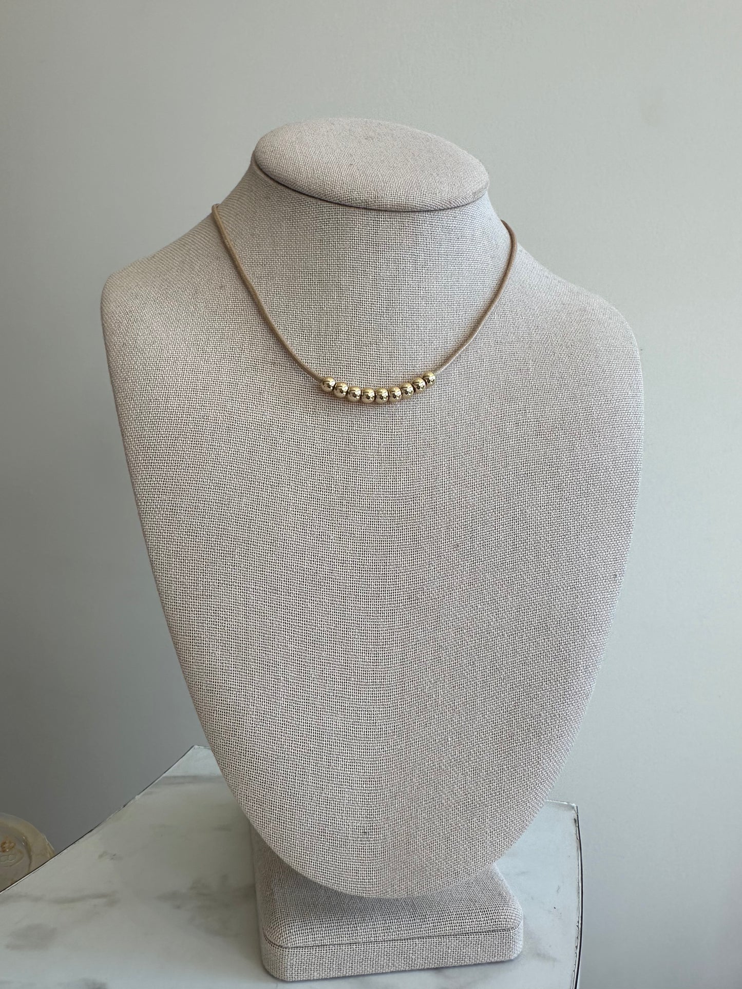 The Brown Beaded Necklace