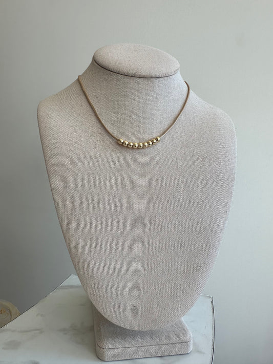 The Brown Beaded Necklace